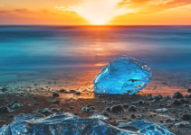 The Enchanting Seascape: Transparent Stones Glowing in the Sunset’s Embrace